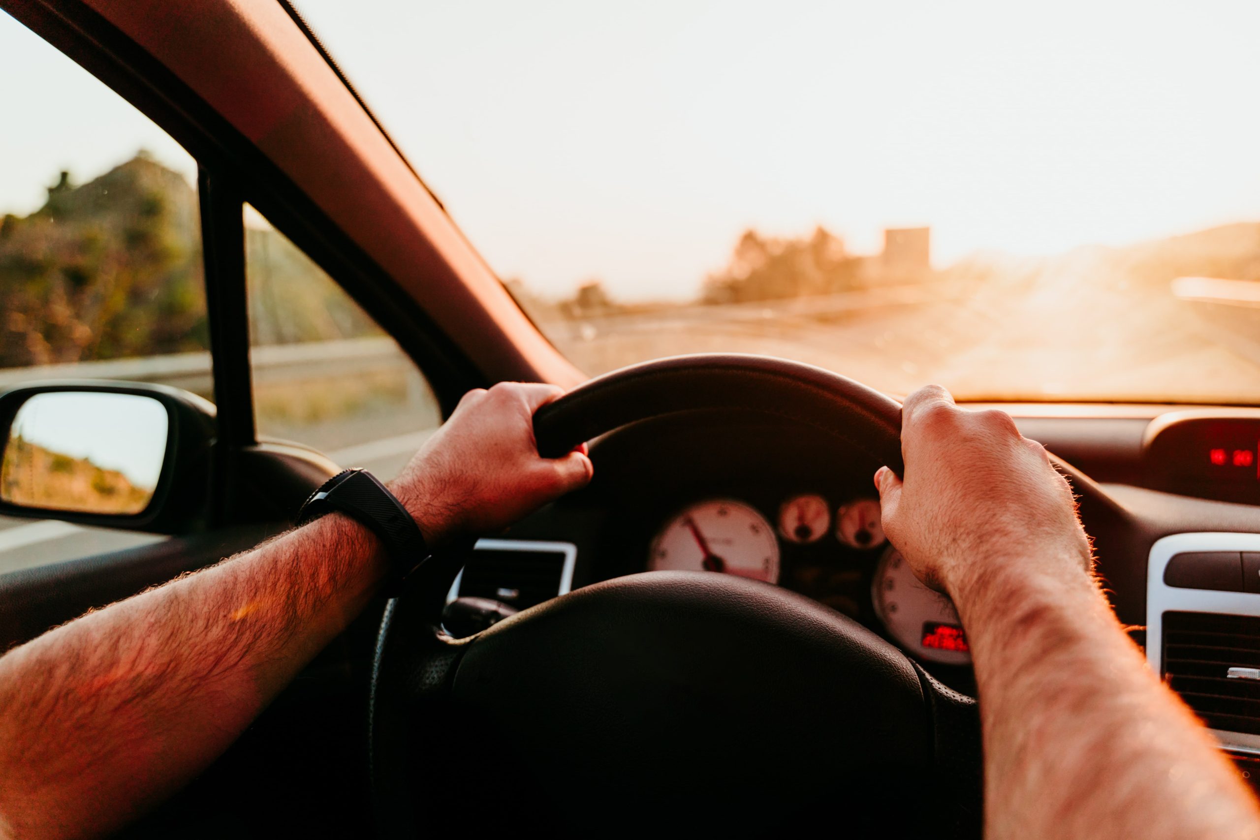 windshield glare appears while driving on road